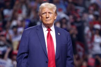 President Trump in blue suit with red tie