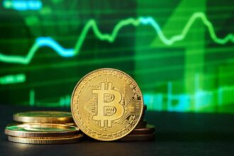 Bitcoin coin with green price chart in background