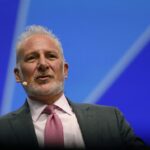 Peter Schiff Holding Gold and Dollar