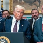 Trump speaking at White House podium about tariffs