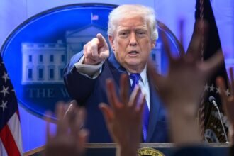 donald trump addressing reporters
